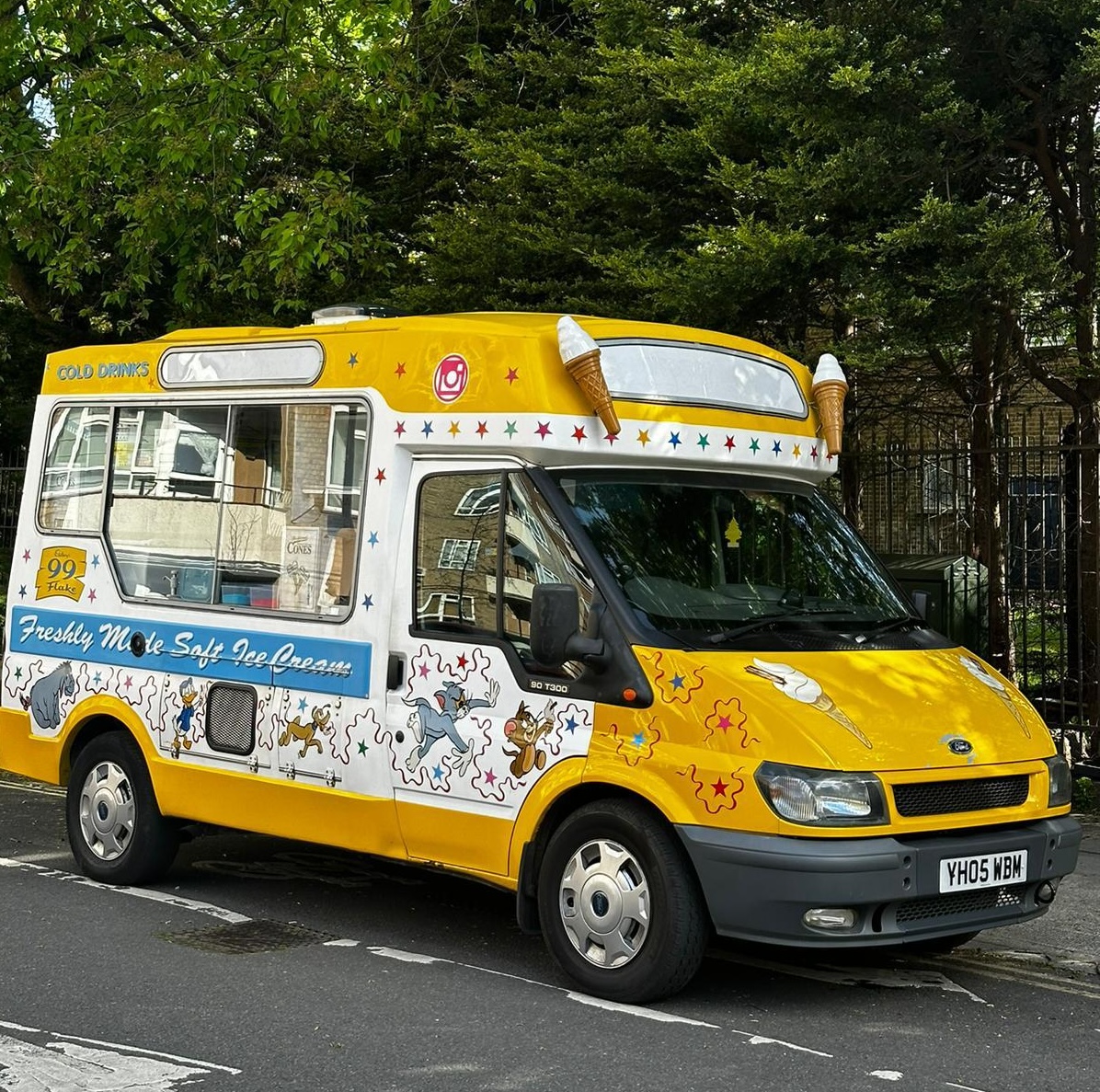 Pastel pink and cream Mr Whippy ice cream van at a garden party